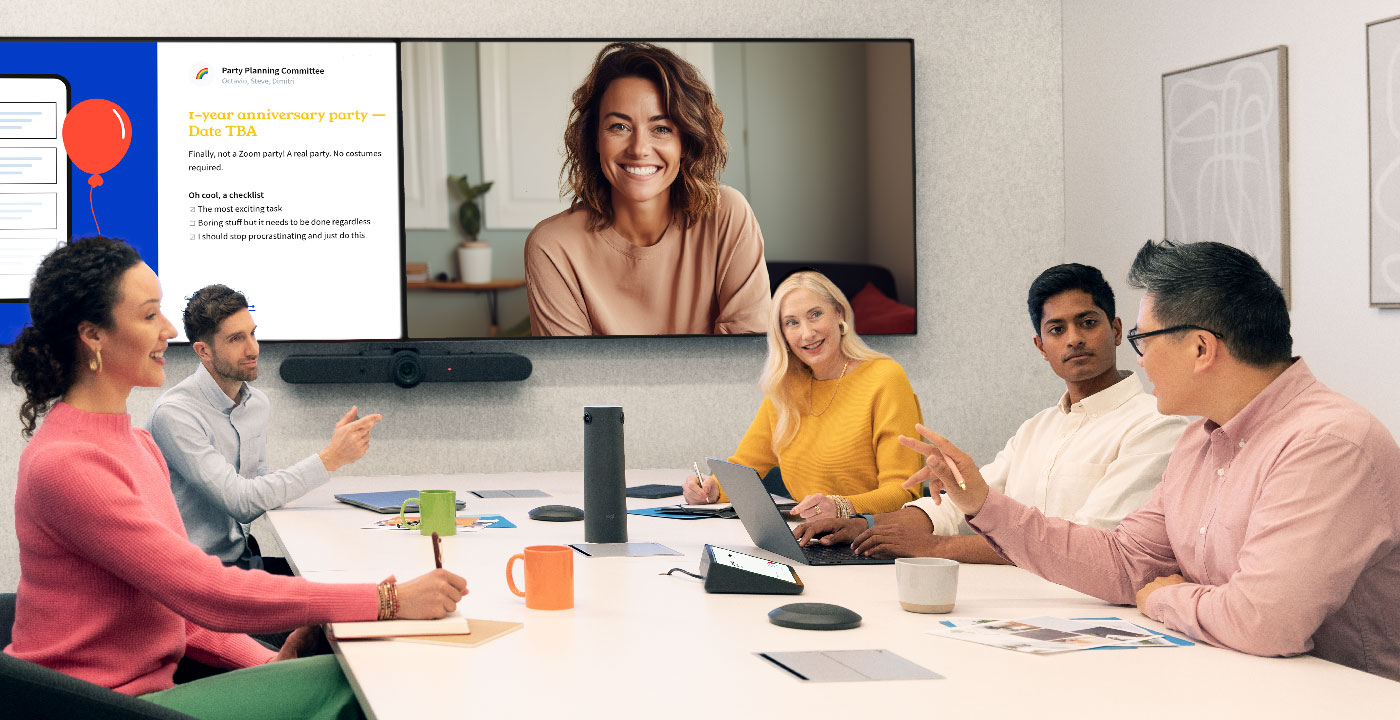 Logitech meeting room solution by AVEX. People meeting hybrid